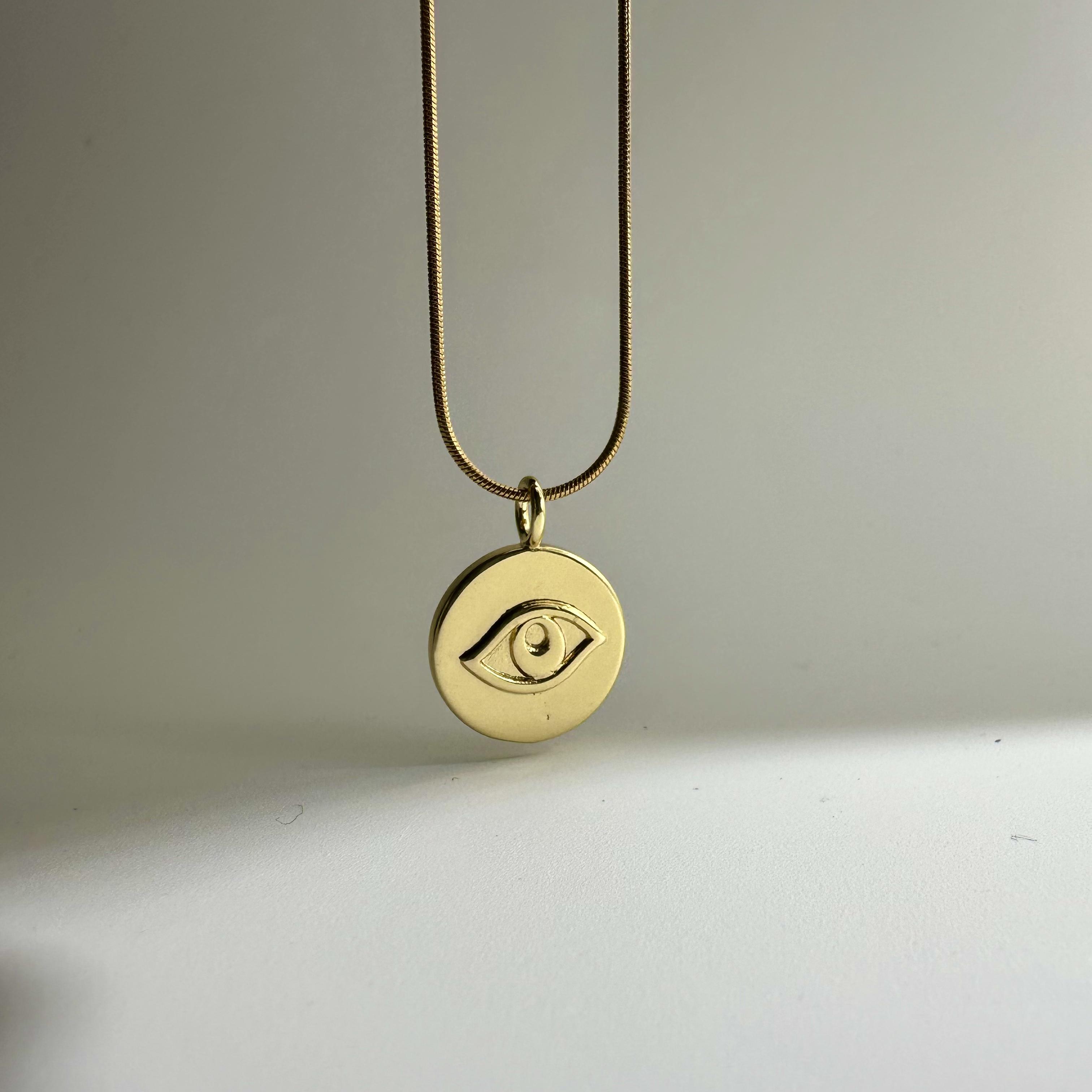 Golden Gleam Eye Pendant